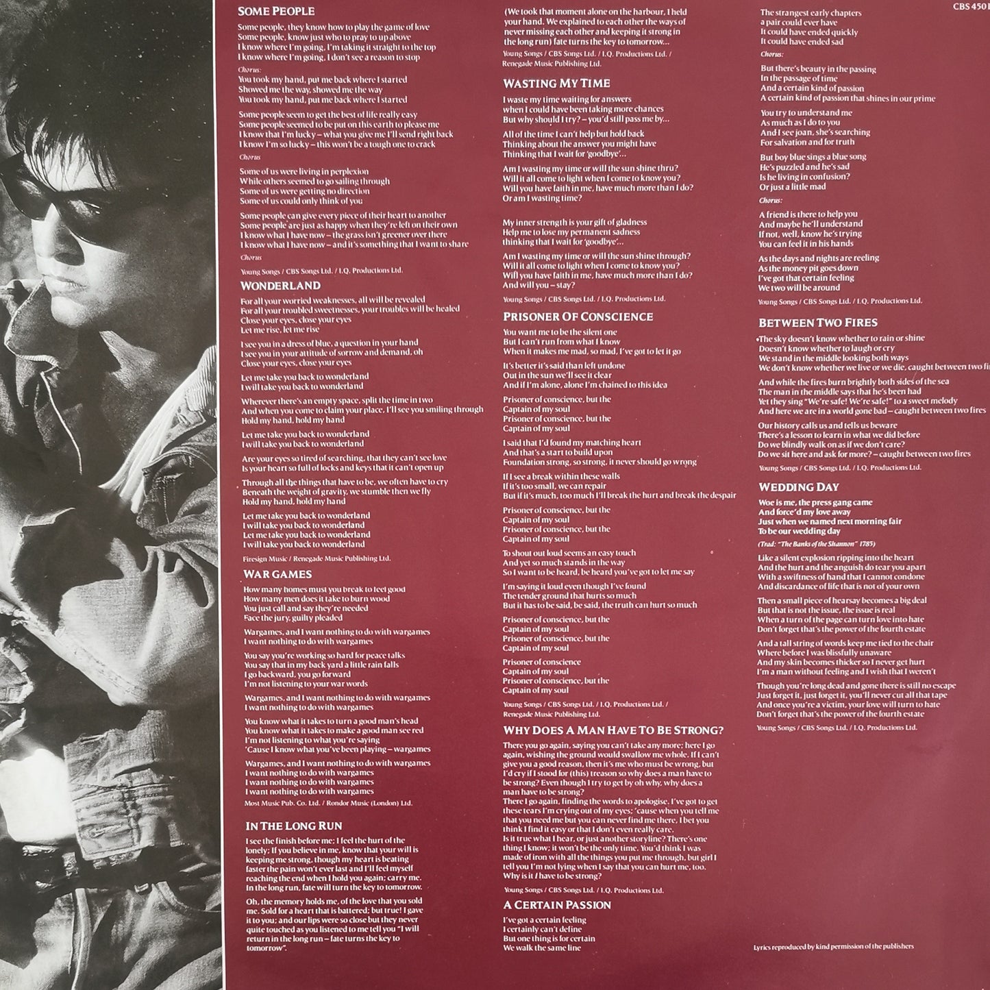 PAUL YOUNG - Between Two Fires