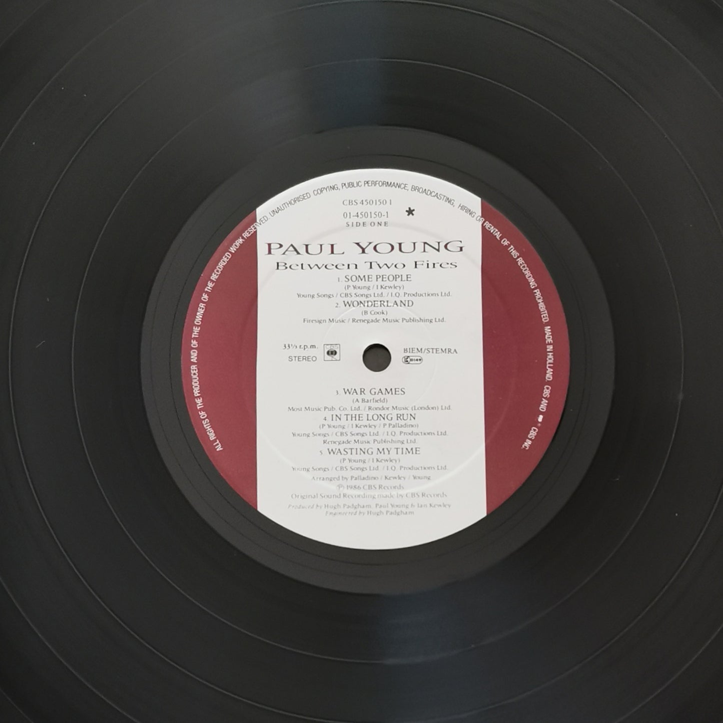 PAUL YOUNG - Between Two Fires