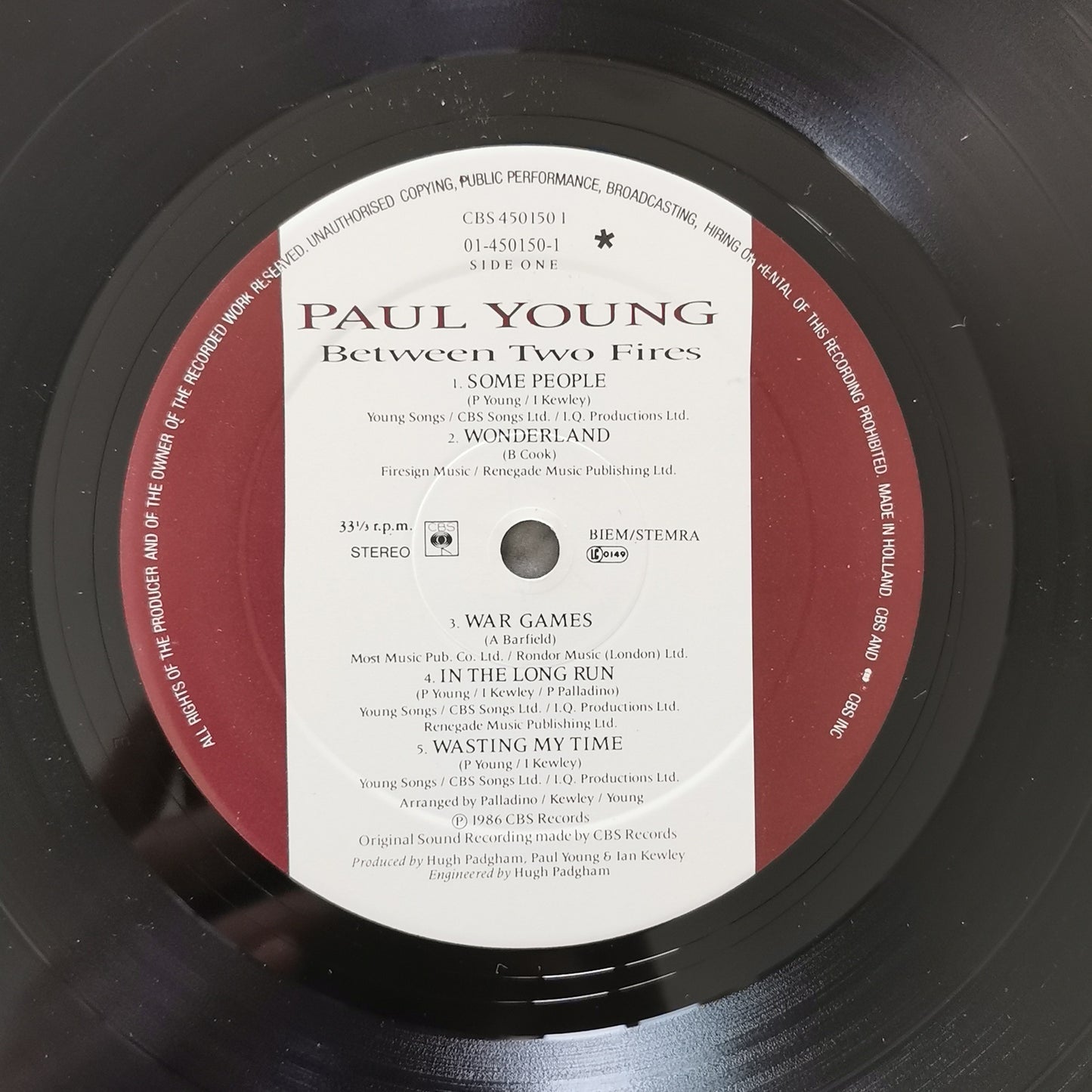 PAUL YOUNG - Between Two Fires