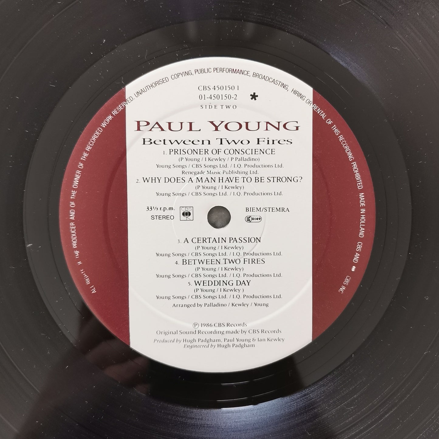 PAUL YOUNG - Between Two Fires