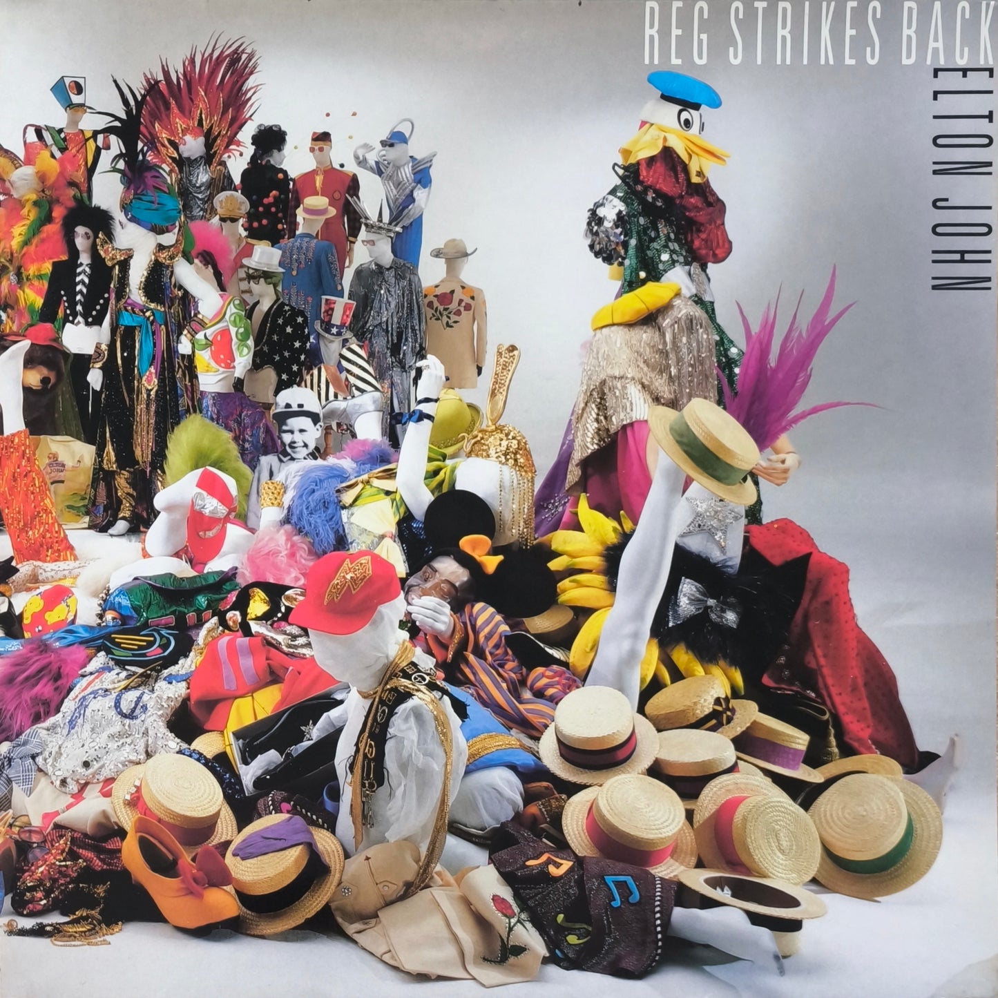 ELTON JOHN - Reg Strikes Back