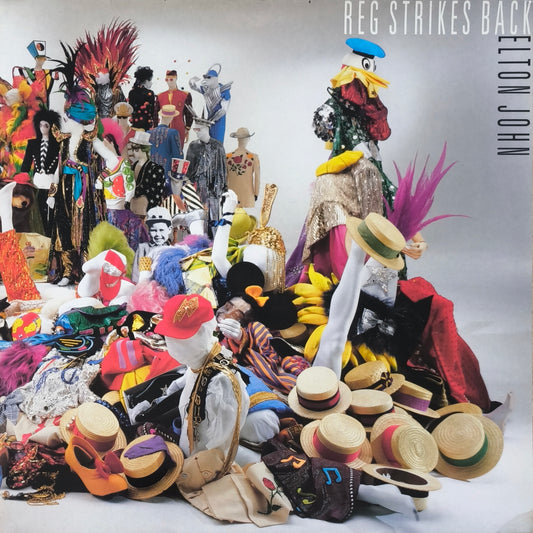 ELTON JOHN - Reg Strikes Back