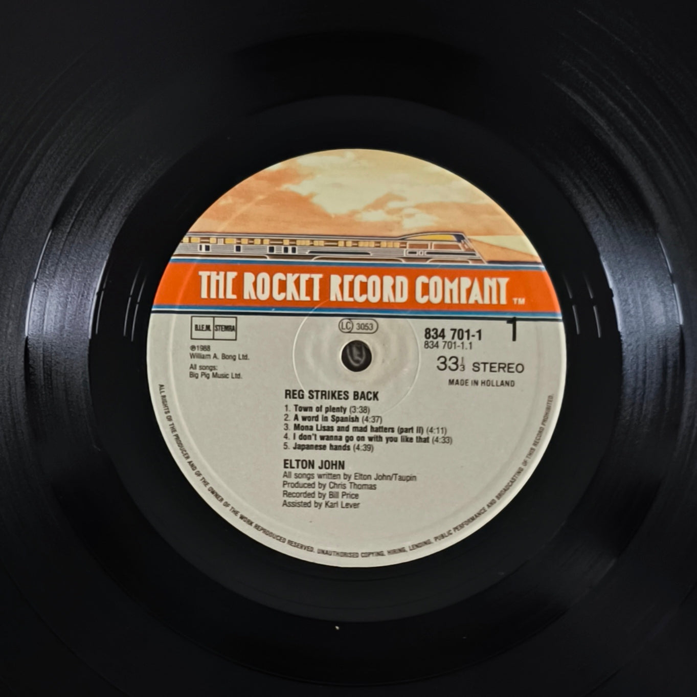 ELTON JOHN - Reg Strikes Back