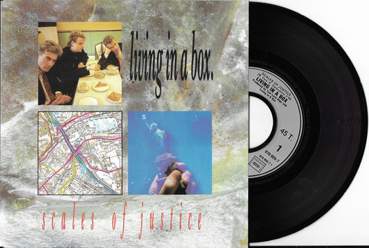 LIVING IN A BOX - Scales Of Justice