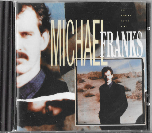 MICHAEL FRANKS - The Camera Never Lies