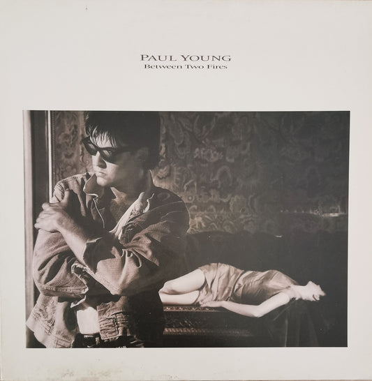 PAUL YOUNG - Between Two Fires