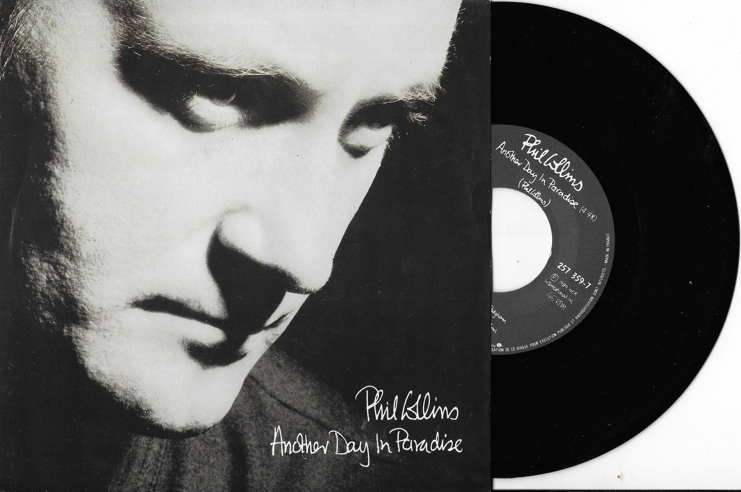 PHIL COLLINS - Another Day In Paradise